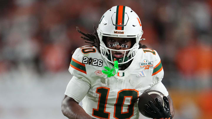 Jan 19, 2026; Miami Gardens, FL, USA; Miami Hurricanes wide receiver Malachi Toney (10) runs with the ball against the Indiana Hoosiers during the second half of the College Football Playoff National Championship game at Hard Rock Stadium. Mandatory Credit: Kirby Lee-Imagn Images