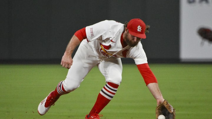 Aug 11, 2025; St. Louis, Missouri, USA;  St. Louis Cardinals second baseman Brendan Donovan (33) fields a ground ball against the Colorado Rockies during the ninth inning at Busch Stadium. Mandatory Credit: Jeff Curry-Imagn Images