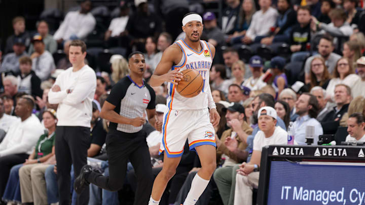 Apr 11, 2025; Salt Lake City, Utah, USA; Oklahoma City Thunder guard Aaron Wiggins (21) brings the ball up the court during the first quarter against the Utah Jazz at Delta Center. Mandatory Credit: Chris Nicoll-Imagn Images Apr 11, 2025; Salt Lake City, Utah, USA; Oklahoma City Thunder guard Aaron Wiggins (21) brings the ball up the court during the first quarter against the Utah Jazz at Delta Center. Mandatory Credit: Chris Nicoll-Imagn Images