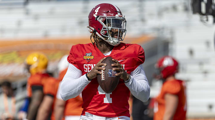 Jan 29, 2025; Mobile, AL, USA; American team quarterback Jalen Milroe of Alabama (4) warms up during Senior Bowl practice for the National team at Hancock Whitney Stadium. Mandatory Credit: Vasha Hunt-Imagn Images