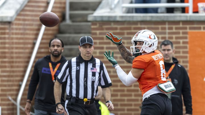 Jan 30, 2025; Mobile, AL, USA; National team wide receiver Xavier Restrepo of Miami (6) grabs a pass during Senior Bowl practice for the National team at Hancock Whitney Stadium. Mandatory Credit: Vasha Hunt-Imagn Images