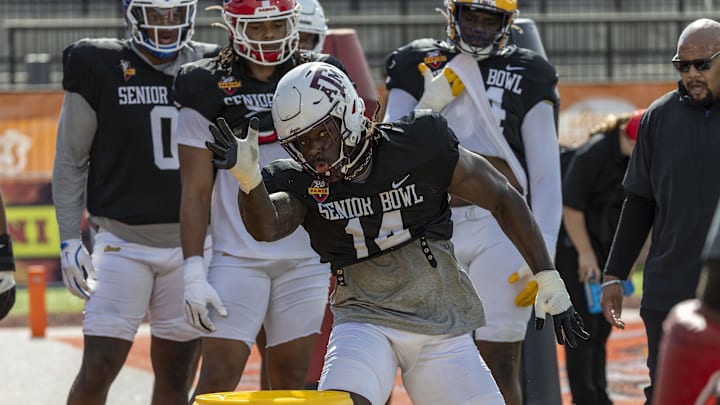 Jan 29, 2025; Mobile, AL, USA;  American team defensive lineman Shemar Stewart of Texas A&M (14) works through drills during Senior Bowl practice at Hancock Whitney Stadium. Mandatory Credit: Vasha Hunt-Imagn Images
