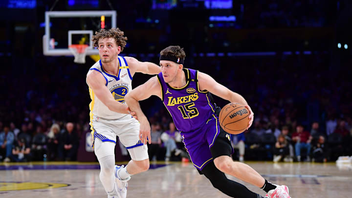 Feb 6, 2025; Los Angeles, California, USA; Los Angeles Lakers guard Austin Reaves (15) moves the ball against Golden State Warriors guard Brandin Podziemski (2) during the first half at Crypto.com Arena. Mandatory Credit: Gary A. Vasquez-Imagn Images Feb 6, 2025; Los Angeles, California, USA; Los Angeles Lakers guard Austin Reaves (15) moves the ball against Golden State Warriors guard Brandin Podziemski (2) during the first half at Crypto.com Arena. Mandatory Credit: Gary A. Vasquez-Imagn Images