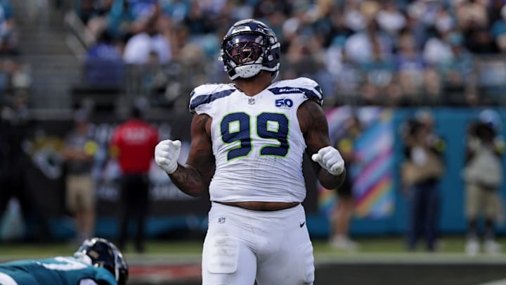 Oct 12, 2025; Jacksonville, Florida, USA; Seattle Seahawks defensive end Leonard Williams (99) celebrates after a sack against the Jacksonville Jaguars during the first half at EverBank Stadium. Mandatory Credit: Travis Register-Imagn Images Oct 12, 2025; Jacksonville, Florida, USA; Seattle Seahawks defensive end Leonard Williams (99) celebrates after a sack against the Jacksonville Jaguars during the first half at EverBank Stadium. Mandatory Credit: Travis Register-Imagn Images