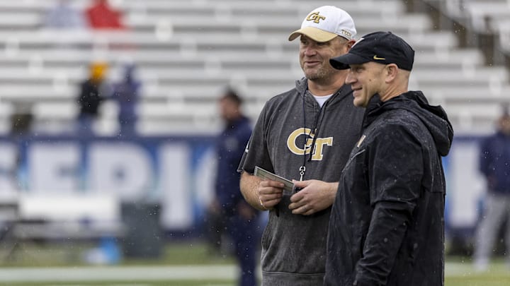 Dec 27, 2024; Birmingham, AL, USA; Georgia Tech Yellow Jackets head coach Brent Key, left, talks with Vanderbilt Commodores head coach Clark Lea during warm-ups before the 2024 Birmingham Bowl at Protective Stadium. Mandatory Credit: Vasha Hunt-Imagn Images Dec 27, 2024; Birmingham, AL, USA; Georgia Tech Yellow Jackets head coach Brent Key, left, talks with Vanderbilt Commodores head coach Clark Lea during warm-ups before the 2024 Birmingham Bowl at Protective Stadium. Mandatory Credit: Vasha Hunt-Imagn Images