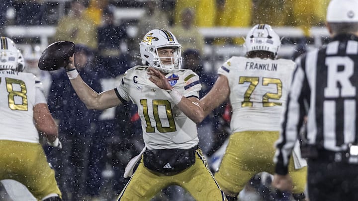 Dec 27, 2024; Birmingham, AL, USA; Georgia Tech Yellow Jackets quarterback Haynes King (10) looks to throw against the Vanderbilt Commodores during the second half of the 2024 Birmingham Bowl at Protective Stadium. Mandatory Credit: Vasha Hunt-Imagn Images Dec 27, 2024; Birmingham, AL, USA; Georgia Tech Yellow Jackets quarterback Haynes King (10) looks to throw against the Vanderbilt Commodores during the second half of the 2024 Birmingham Bowl at Protective Stadium. Mandatory Credit: Vasha Hunt-Imagn Images