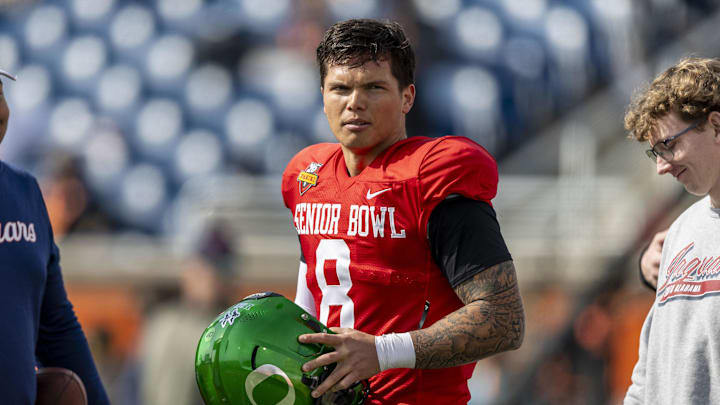Jan 28, 2025; Mobile, AL, USA; National team quarterback Dillon Gabriel of Oregon (8) pauses after practice during Senior Bowl practice for the National team at Hancock Whitney Stadium. Mandatory Credit: Vasha Hunt-Imagn Images