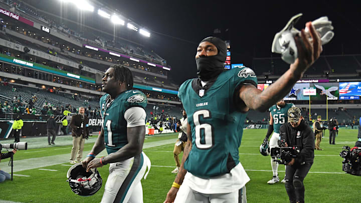 Dec 15, 2024; Philadelphia, Pennsylvania, USA; Philadelphia Eagles wide receiver A.J. Brown (11) and  wide receiver DeVonta Smith (6) walk off the field after win against the Pittsburgh Steelers at Lincoln Financial Field. Mandatory Credit: Eric Hartline-Imagn Images