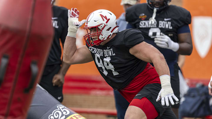 Jan 30, 2025; Mobile, AL, USA; National team defensive lineman Ty Robinson of Nebraska (94) works through drills during Senior Bowl practice for the National team at Hancock Whitney Stadium. Mandatory Credit: Vasha Hunt-Imagn Images Jan 30, 2025; Mobile, AL, USA; National team defensive lineman Ty Robinson of Nebraska (94) works through drills during Senior Bowl practice for the National team at Hancock Whitney Stadium. Mandatory Credit: Vasha Hunt-Imagn Images