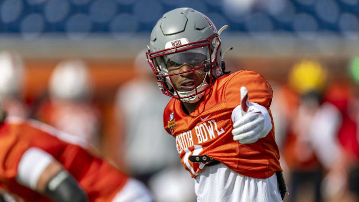 Jan 28, 2025; Mobile, AL, USA; National team wide receiver Kyle Williams of Washington State (11) sets up at the line during Senior Bowl practice for the National team at Hancock Whitney Stadium. Jan 28, 2025; Mobile, AL, USA; National team wide receiver Kyle Williams of Washington State (11) sets up at the line during Senior Bowl practice for the National team at Hancock Whitney Stadium.