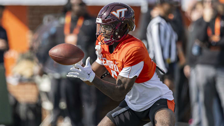 Jan 29, 2025; Mobile, AL, USA; National team wide receiver Da'Quan Felton of Virginia Tech (5) grabs a pass during Senior Bowl practice for the National team at Hancock Whitney Stadium. 