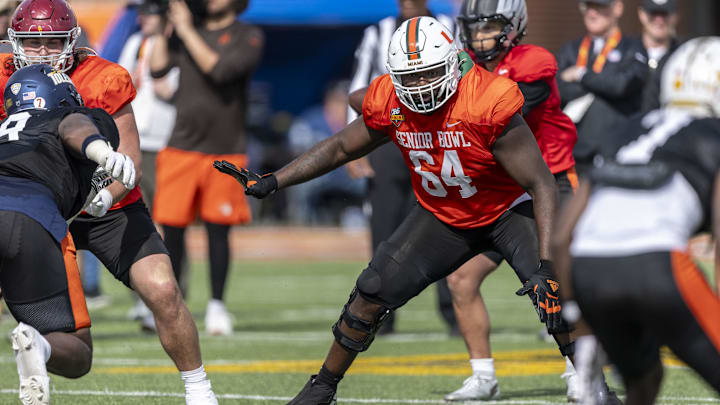 Jan 29, 2025; Mobile, AL, USA; National team offensive lineman Jalen Rivers of Miami (64) looks to block during Senior Bowl practice for the National team at Hancock Whitney Stadium. Mandatory Credit: Vasha Hunt-Imagn Images Jan 29, 2025; Mobile, AL, USA; National team offensive lineman Jalen Rivers of Miami (64) looks to block during Senior Bowl practice for the National team at Hancock Whitney Stadium. Mandatory Credit: Vasha Hunt-Imagn Images