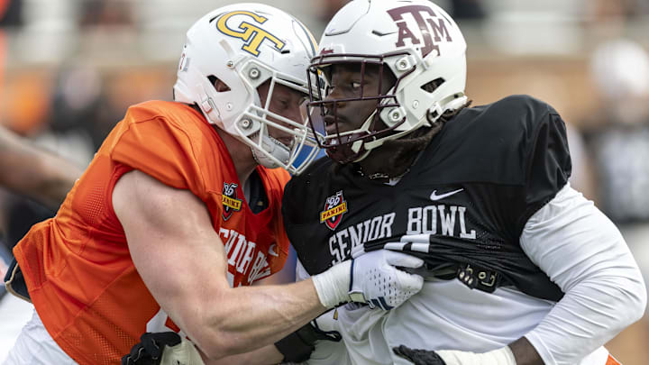 American team defensive lineman Shemar Stewart of Texas A&M (right) battles against a blocker at the Senior Bowl.