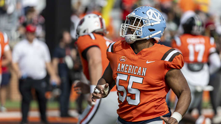 Feb 1, 2025; Mobile, AL, USA; American team offensive lineman Willie Lampkin of North Carolina (55) warms up before the 2025 Senior Bowl football game at Hancock Whitney Stadium. Mandatory Credit: Vasha Hunt-Imagn Images