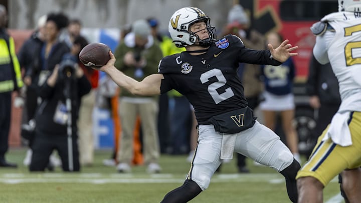 Dec 27, 2024; Birmingham, AL, USA;  Vanderbilt Commodores quarterback Diego Pavia (2) throws the ball against the Georgia Tech Yellow Jackets during the first half of the 2024 Birmingham Bowl at Protective Stadium. Mandatory Credit: Vasha Hunt-Imagn Images