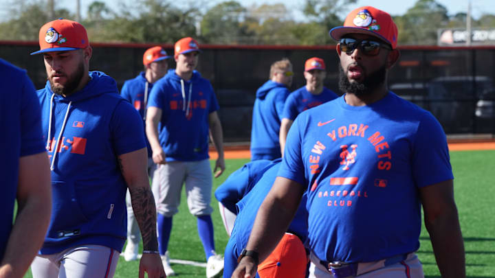 Feb 12, 2026; Port St. Lucie, FL, USA;  New York Mets pitchers warm-up during spring training. Mandatory Credit: Jim Rassol-Imagn Images