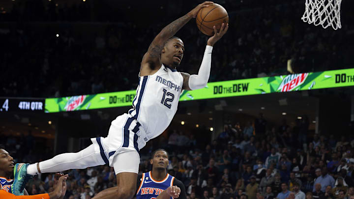 Memphis Grizzlies guard Ja Morant (12) is called for a charge on New York Knicks guard Jalen Brunson (11) with 0.5 second left in regulation at FedExForum. Mandatory Credit: Petre Thomas-Imagn Images Memphis Grizzlies guard Ja Morant (12) is called for a charge on New York Knicks guard Jalen Brunson (11) with 0.5 second left in regulation at FedExForum. Mandatory Credit: Petre Thomas-Imagn Images