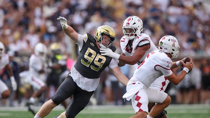 Sep 20, 2025; Atlanta, Georgia, USA; Georgia Tech Yellow Jackets defensive lineman Jordan van den Berg (99) rushes the passer against the Temple Owls in the second quarter at Bobby Dodd Stadium at Hyundai Field. Mandatory Credit: Brett Davis-Imagn Images
