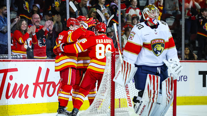 Mar 20, 2026; Calgary, Alberta, CAN; Calgary Flames left wing Joel Farabee (86) celebrates his goal against Florida Panthers goaltender Daniil Tarasov (40) during the second period at Scotiabank Saddledome. Mandatory Credit: Sergei Belski-Imagn Images