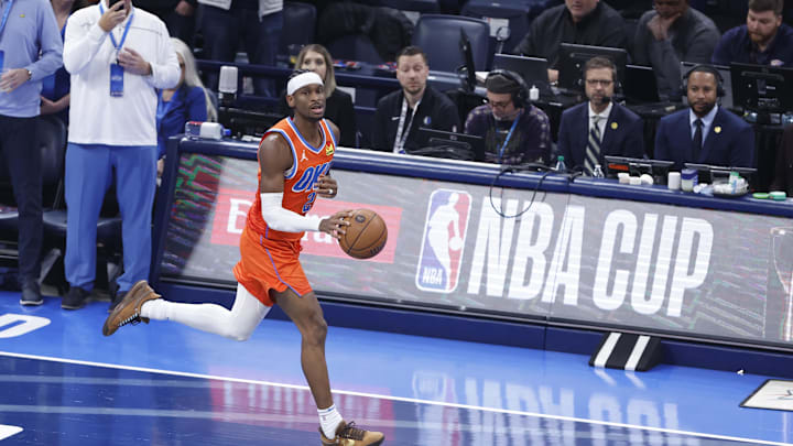 Dec 10, 2024; Oklahoma City, Oklahoma, USA; Oklahoma City Thunder guard Shai Gilgeous-Alexander (2) dribbles the ball down the court against the Dallas Mavericks during the first quarter at Paycom Center. Mandatory Credit: Alonzo Adams-Imagn Images Dec 10, 2024; Oklahoma City, Oklahoma, USA; Oklahoma City Thunder guard Shai Gilgeous-Alexander (2) dribbles the ball down the court against the Dallas Mavericks during the first quarter at Paycom Center. Mandatory Credit: Alonzo Adams-Imagn Images