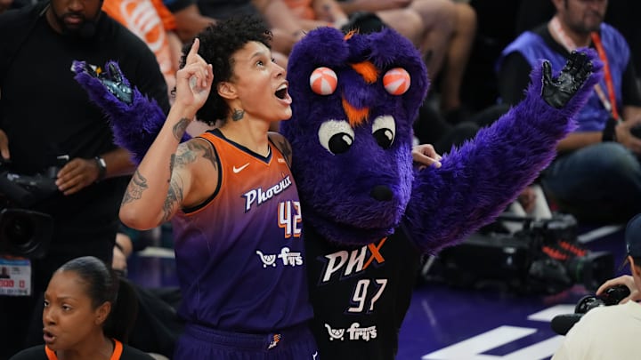 Phoenix Mercury center Brittney Griner and mascot Scorch celebrate her score in the WNBA All-Star Game Skills Challenge at Footprint Center in Phoenix on Friday, July 19, 2024.