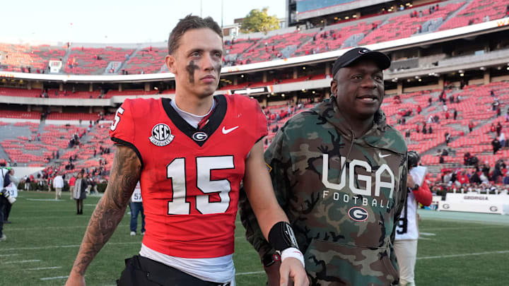 Georgia quarterback Carson Beck (15) leaves the field after a NCAA college football game against Massachusetts in Athens, Ga., on Saturday, Nov. 23, 2024. Georgia won 59-21. Georgia quarterback Carson Beck (15) leaves the field after a NCAA college football game against Massachusetts in Athens, Ga., on Saturday, Nov. 23, 2024. Georgia won 59-21.