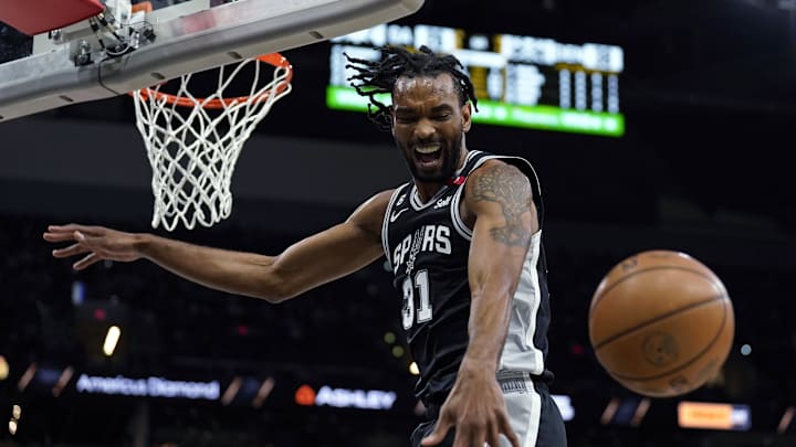 Mar 10, 2023; San Antonio, Texas, USA; San Antonio Spurs forward Keita Bates-Diop (31) loses control