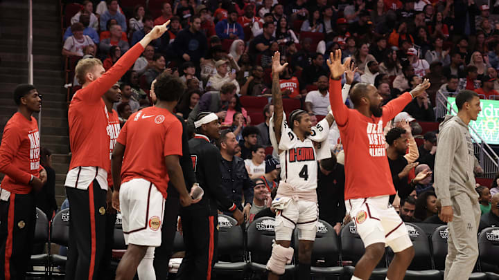 Feb 12, 2025; Houston, Texas, USA; Houston Rockets guard Jalen Green (4) and teammates celebrate during the second half against the Phoenix Suns at Toyota Center. Mandatory Credit: Thomas Shea-Imagn Images