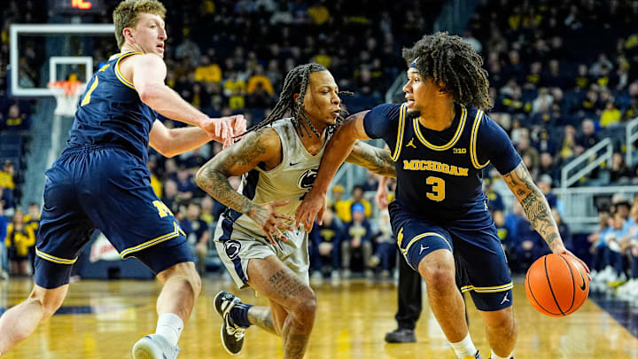 Michigan guard Tre Donaldson (3) dribbles against Penn State guard Ace Baldwin Jr. (1) during the first half at Crisler Center in Ann Arbor on Monday, Jan. 27, 2025. Michigan guard Tre Donaldson (3) dribbles against Penn State guard Ace Baldwin Jr. (1) during the first half at Crisler Center in Ann Arbor on Monday, Jan. 27, 2025.