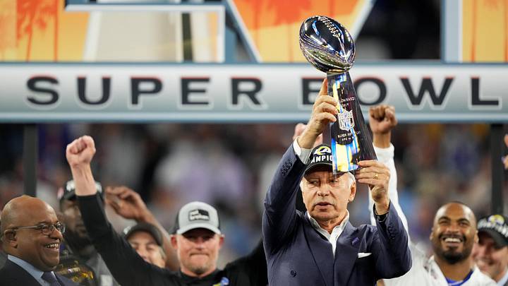 Los Angeles Rams owner Stan Kroenke raises the Lombardi Trophy at the conclusion of Super Bowl LVI between the Los Angeles Rams and the Cincinnati Bengals, Sunday, Feb. 13, 2022, at SoFi Stadium in Inglewood, Calif.  The Los Angeles Angels have been sold to Rams owner Stan Kroenke, adding to the Walmart heir's burgeoning and increasingly successful sports portfolio.