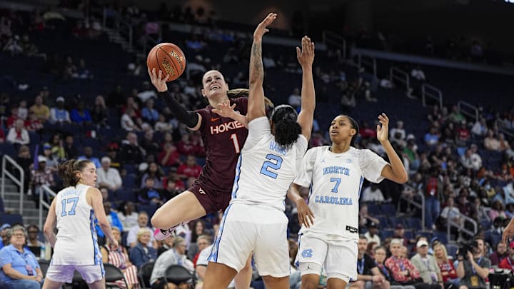 Mar 6, 2026; Duluth, GA, USA; Virginia Tech Hokies guard Carleigh Wenzel (1) shoots against North Carolina Tar Heels forward Nyla Harris (2) at Gas South Arena. Mandatory Credit: Dale Zanine-Imagn Images