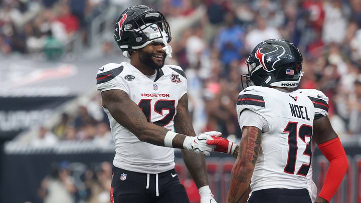 Houston Texans wide receiver Nico Collins (12) celebrates a touchdown catch with wide receiver Jaylin Noel (13)
