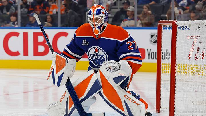 Sep 26, 2026; Edmonton, Alberta, CAN; Edmonton Oilers goaltender Devon Levi (27)  gets ready to face a shot against the Calgary Flames at Rogers Place. Mandatory Credit: Perry Nelson-Imagn Images
