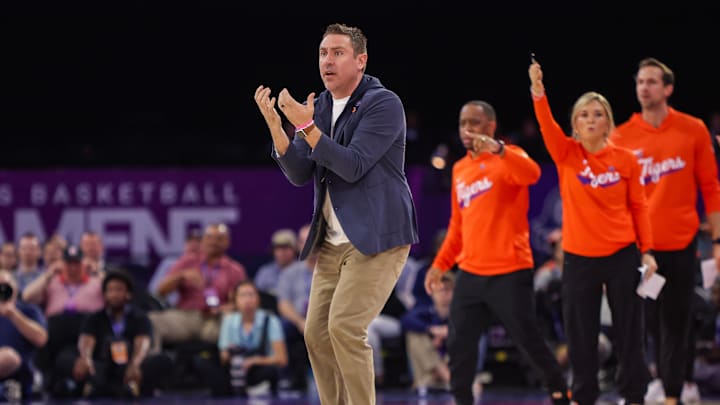 Mar 6, 2026; Duluth, GA, USA; Clemson Tigers head coach Shawn Poppie reacts to a call against the Duke Blue Devils in the second quarter at Gas South Arena. Mandatory Credit: Brett Davis-Imagn Images
Mar 6, 2026; Duluth, GA, USA; Clemson Tigers head coach Shawn Poppie reacts to a call against the Duke Blue Devils in the second quarter at Gas South Arena. Mandatory Credit: Brett Davis-Imagn Images