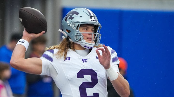 Oct 25, 2025; Lawrence, Kansas, USA; Kansas State Wildcats quarterback Avery Johnson (2) warms up against the Kansas Jayhawks prior to a game at David Booth Kansas Memorial Stadium. Mandatory Credit: Denny Medley-Imagn Images