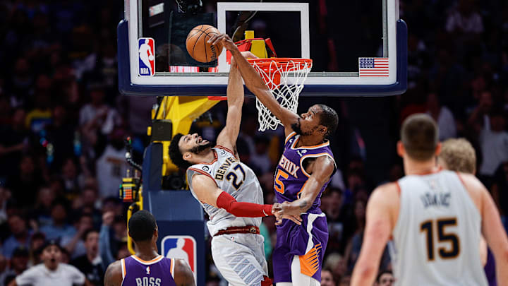 May 9, 2023; Denver, Colorado, USA; Phoenix Suns forward Kevin Durant (35) blocks the dunk of Denver