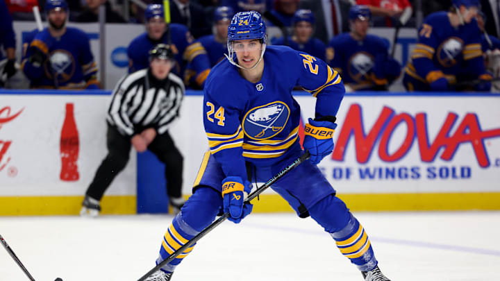 Feb 2, 2025; Buffalo, New York, USA;  Buffalo Sabres center Dylan Cozens (24) looks to make a pass during the second period against the New Jersey Devils at KeyBank Center. Mandatory Credit: Timothy T. Ludwig-Imagn Images