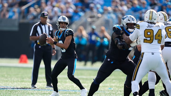 Nov 9, 2025; Charlotte, North Carolina, USA; Carolina Panthers quarterback Bryce Young (9) drops back to pass during the first quarter against the New Orleans Saints at Bank of America Stadium. Mandatory Credit: Jim Dedmon-Imagn Images