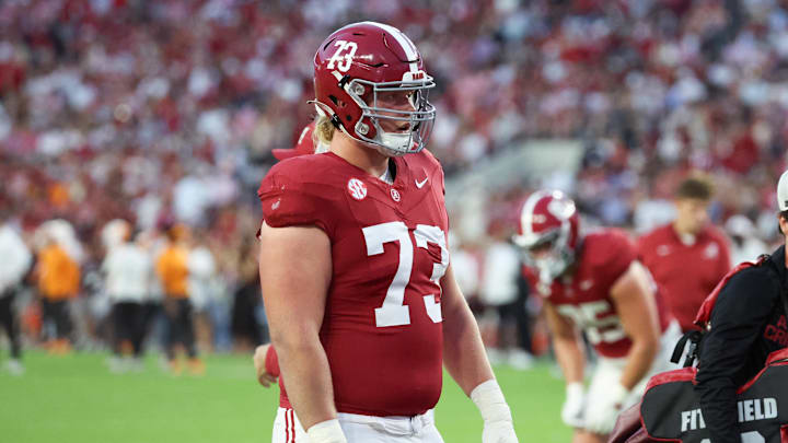 Oct 18, 2025; Tuscaloosa, Alabama, USA; Alabama Crimson Tide offensive lineman Olaus Alinen (73) looks on during warm ups before the game against the Tennessee Volunteers at Saban Field at Bryant-Denny Stadium. 