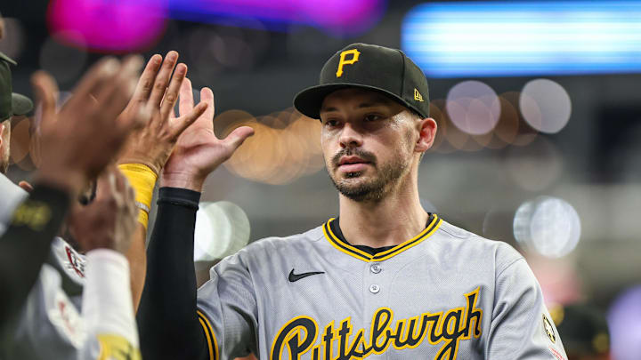 Sep 27, 2025; Cumberland, Georgia, USA; Pittsburgh Pirates outfielder Bryan Reynolds (10) high fives teammates after the victory against the Atlanta Braves at Truist Park. Mandatory Credit: Jordan Godfree-Imagn Images Sep 27, 2025; Cumberland, Georgia, USA; Pittsburgh Pirates outfielder Bryan Reynolds (10) high fives teammates after the victory against the Atlanta Braves at Truist Park. Mandatory Credit: Jordan Godfree-Imagn Images
