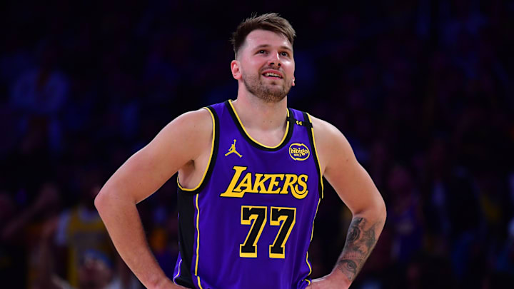 Los Angeles Lakers guard Luka Doncic (77) reacts against the Dallas Mavericks during the first quarter at Crypto.com Arena.