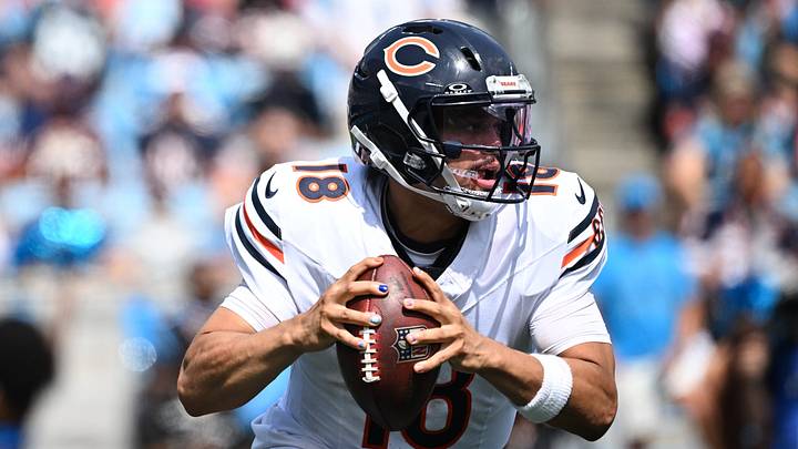 Chicago Bears quarterback Caleb Williams (18) looks to throw Chicago Bears quarterback Caleb Williams (18) looks to throw