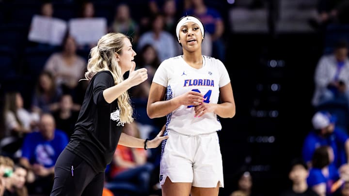 Florida Gators head coach Kelly Rae Finley talks with Florida Gators center Ra Shaya Kyle (24) during the first half against the Vanderbilt Commodores at Billy Donovan Court at Exactech Arena in Gainesville, FL on Sunday, January 22, 2023. [Matt Pendleton/Gainesville Sun]

Ncaa Women S Basketball Florida Vs Vanderbilt