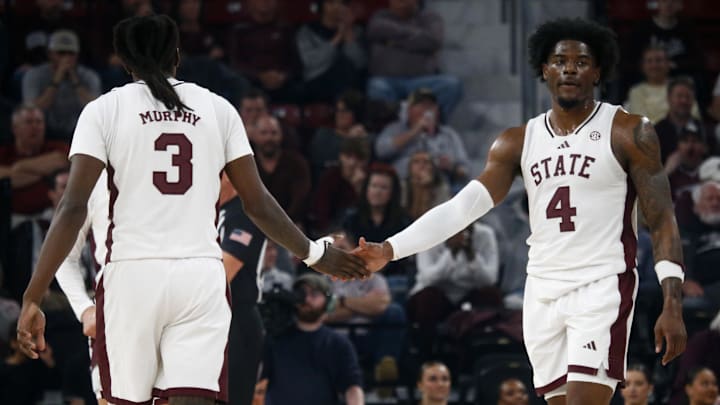 Mar 4, 2025; Starkville, Mississippi, USA; Mississippi State Bulldogs forward Cameron Matthews (4) reacts with forward KeShawn Murphy (3) during the first half against the Texas Longhorns at Humphrey Coliseum. Mandatory Credit: Petre Thomas-Imagn Images