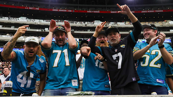 Nov 9, 2025; Houston, Texas, USA; Jacksonville Jaguars fans cheer against the Houston Texans in the first half  at NRG Stadium. Mandatory Credit: Thomas Shea-Imagn Images