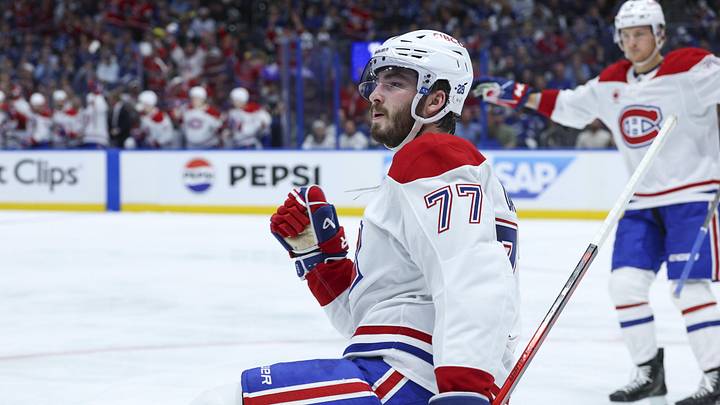 Apr 29, 2026; Tampa, Florida, USA; Montreal Canadiens center Kirby Dach (77) reacts after scoring a goal against the Tampa Bay Lightning in the second period during game five of the first round of the 2026 Stanley Cup Playoffs at Benchmark International Arena. Mandatory Credit: Nathan Ray Seebeck-Imagn Images