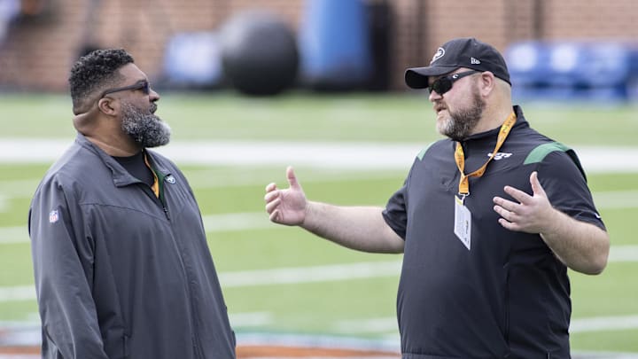 Feb 1, 2022; Mobile, AL, USA; National head coach Ron Middleton of the New York Jets (left) talks