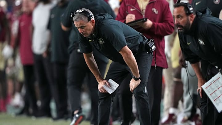 Dec 30, 2023; Miami Gardens, FL, USA; Florida State Seminoles head coach Mike Norvell reacts against