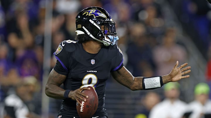 Sep 22, 2025; Baltimore, Maryland, USA; Baltimore Ravens quarterback Lamar Jackson (8) drops back to pass against the Detroit Lions during the first half at M&T Bank Stadium. Mandatory Credit: Peter Casey-Imagn Images
