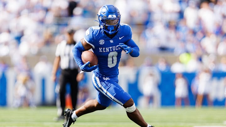 Sep 30, 2023; Lexington, Kentucky, USA; Kentucky Wildcats running back Demie Sumo-Karngbaye (0) runs the ball during the fourth quarter against the Florida Gators at Kroger Field. Mandatory Credit: Jordan Prather-Imagn Images